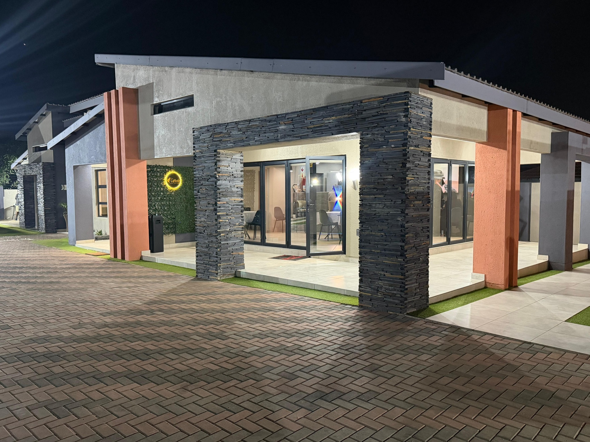 Stone-clad guest house entrance